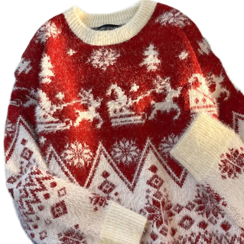 Red sweater with white Christmas-themed pattern on a white background