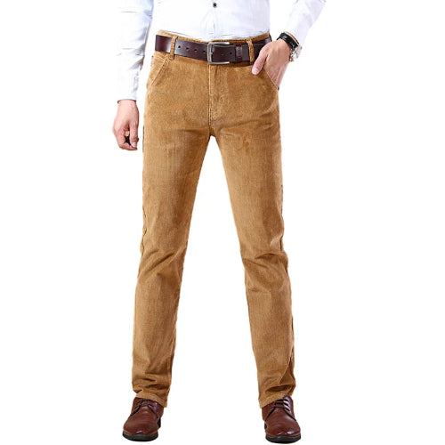 Brown pants worn by a person on a white background