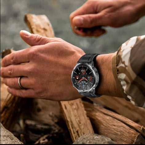 Person wearing a smartwatch outdoors with a natural background