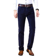 Navy blue pants worn by a person on a white background