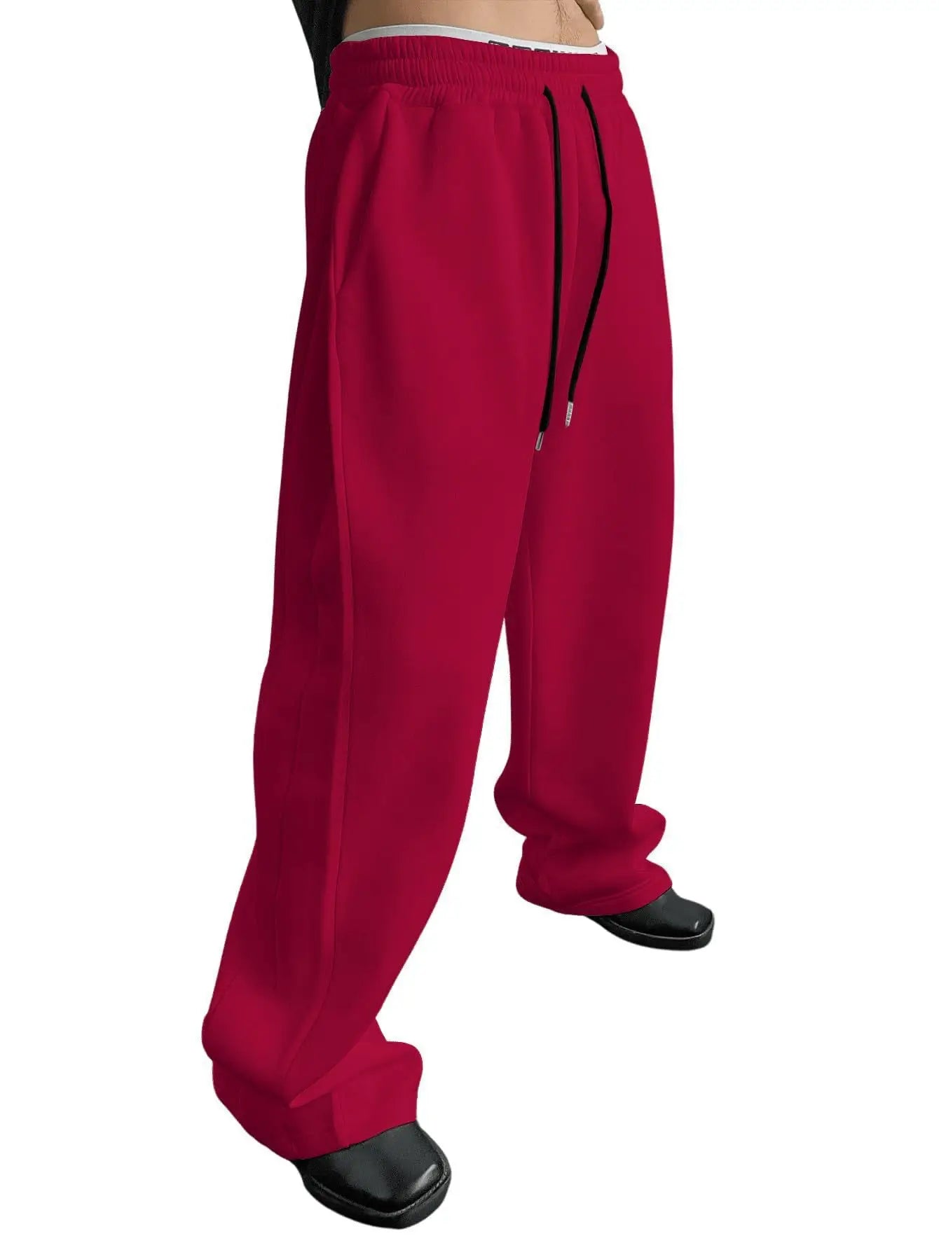 Red sweatpants on a white background