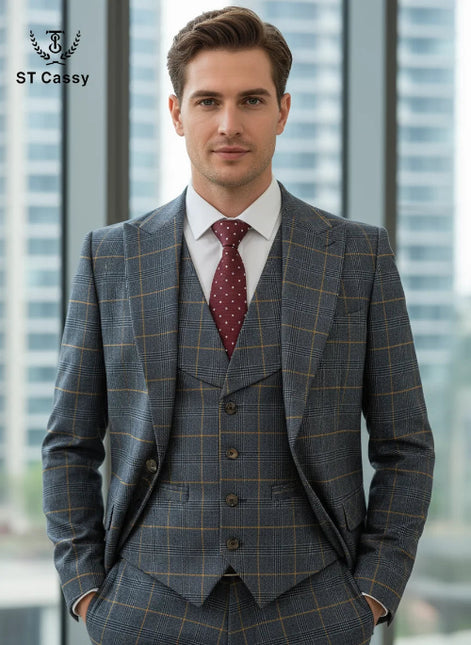 Man wearing a gray checkered suit with a red patterned tie in front of a blurred cityscape.