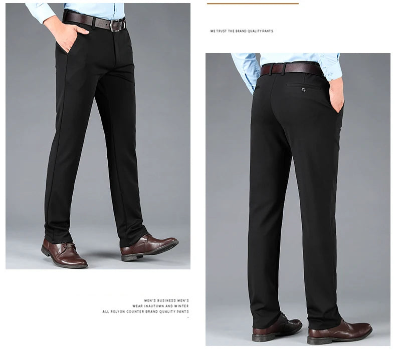 Black dress pants worn by a person on a gray background