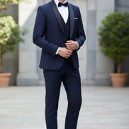 Navy blue suit with jacket, vest, and pants on a white background