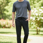 Black pants with drawstring waist on a white background
