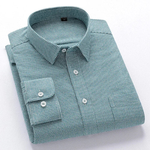 A folded long-sleeve button-down dress shirt with a fine green and white micro-check pattern, featuring a pointed collar,