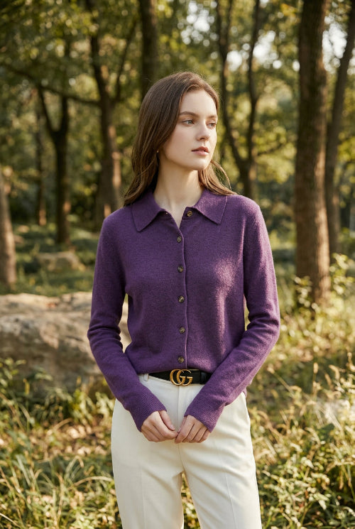Purple button-up shirt worn by a person with a blurred background