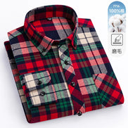 Plaid shirt with red, green, and black pattern on a white background