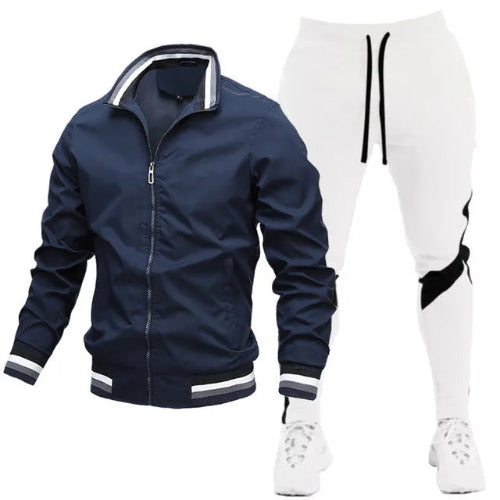 Navy jacket and white pants with black accents on a white background