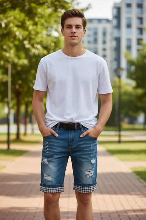 Blue denim shorts with plaid lining on a yellow background