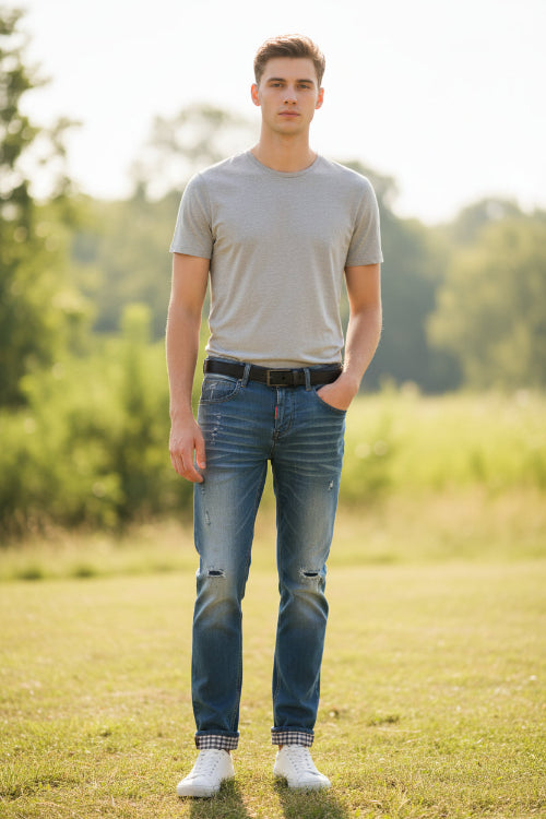 Blue denim shorts with plaid lining on a yellow background
