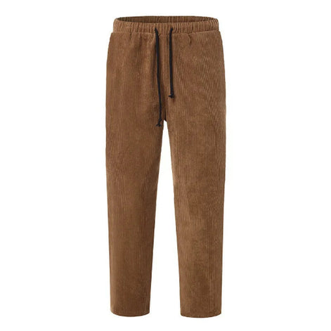 A pair of brown corduroy pants with an elastic waistband and a black drawstring, shown against a plain white background.
