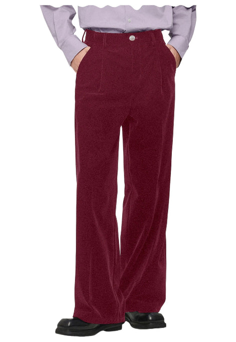 A person wearing high-waisted, wide-leg burgundy corduroy trousers, paired with a light lavender ruffled off-the-shoulder shirt 
