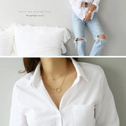 Photo collage of the white button-down shirt showing a standing shot and a close-up with text overlay.