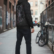 Black hoodie with a panther design on the back against a white background
