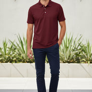 Maroon polo shirt on a white background