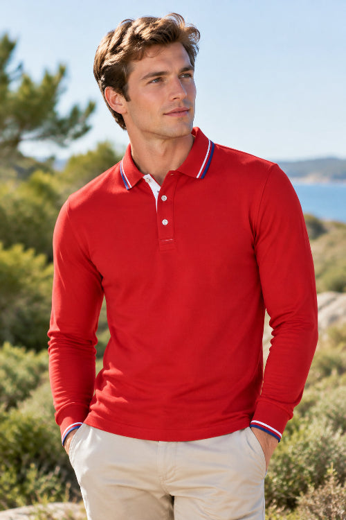A red long-sleeve polo shirt with a white and blue striped collar and matching striped cuffs, shown on a plain white background.