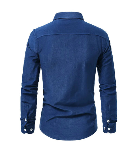 A men's long-sleeve button-up shirt in a rich medium blue, shown from the back view on a clean white background.