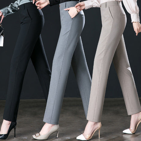 Three pairs of pants in black, gray, and beige worn by models against a dark background.