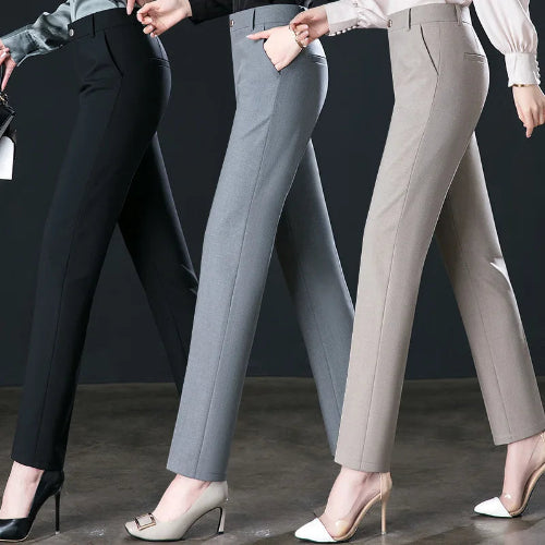 Three pairs of pants in black, gray, and beige worn by models against a dark background.