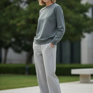 Gray sweatshirt with black accents on a white background
