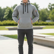 Gray hoodie with orange accents on a white background