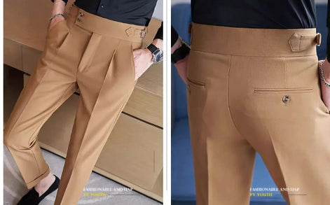 Close-up of beige pants with a focus on details against a blue background.
