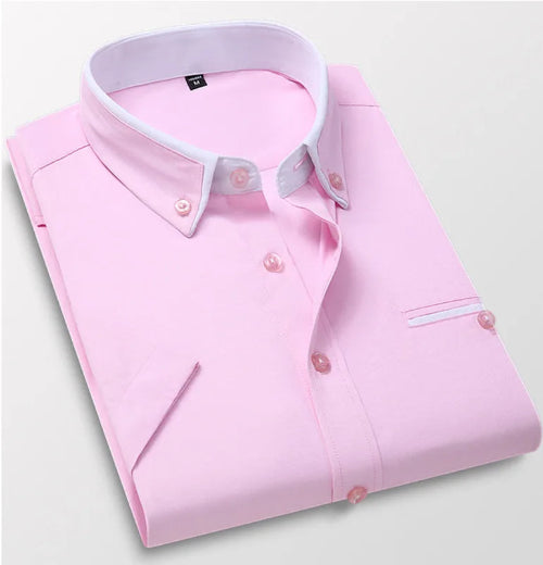 Pink dress shirt with white collar and buttons on a light gray background