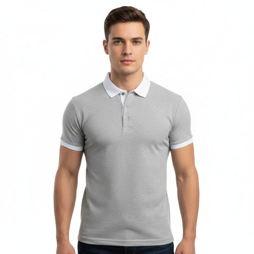 Man wearing a gray polo shirt on a white background