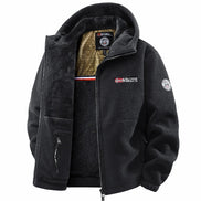 Black jacket with visible branding on a white background