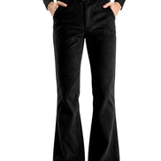 Black flared pants with a black belt, shown on a headless model with hands in pockets, wearing a black top and black shoes against a white background.