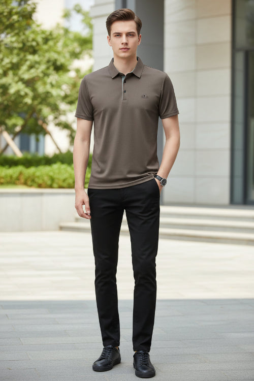 Brown polo shirt worn by a person on a gray background
