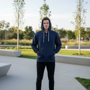 Navy blue hoodie with orange zippers on a white background