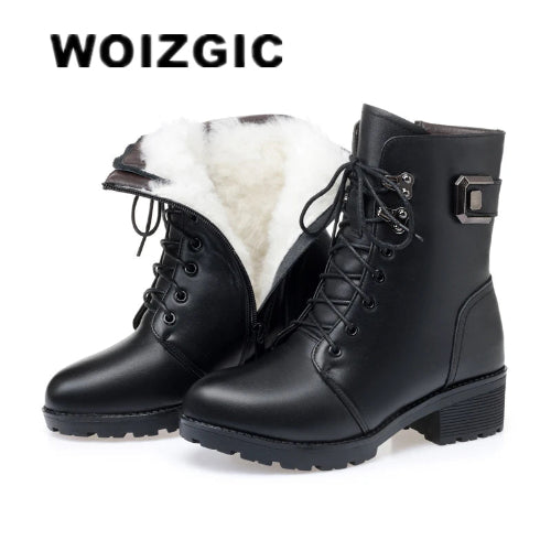 Black leather boots with white fur lining on a white background, branded 'WOIZGIC'.