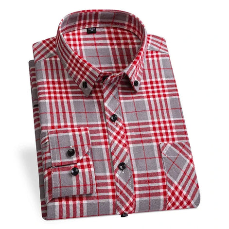 A folded long-sleeve plaid dress shirt in red, gray, and white, featuring a button-down collar and two buttoned chest pockets, shown on a white background.