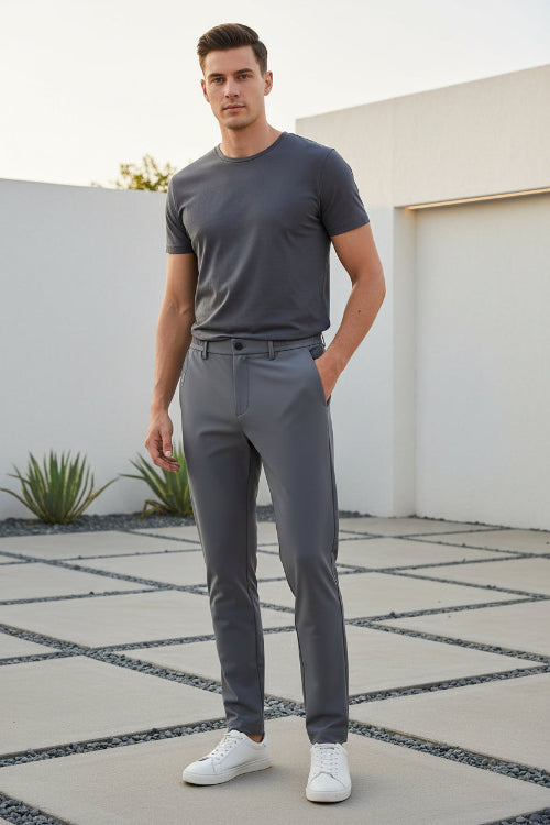 Gray shorts held up against a blue background