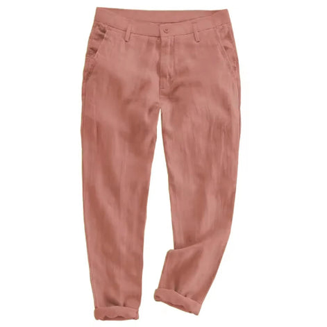 A pair of dusty rose pink trousers with a relaxed, tapered fit and rolled cuffs, shown flat against a solid white background.