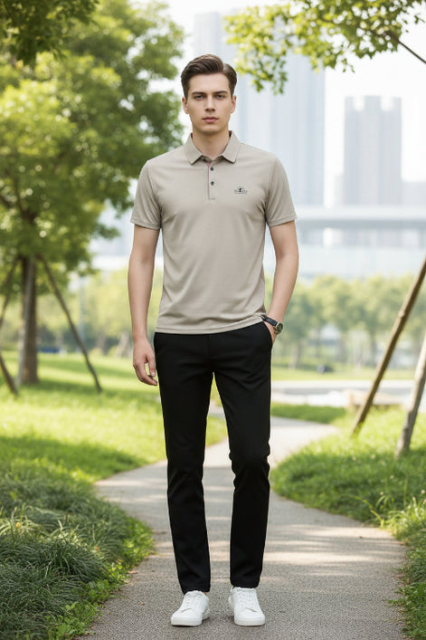 Beige polo shirt with a brand logo on a gray background