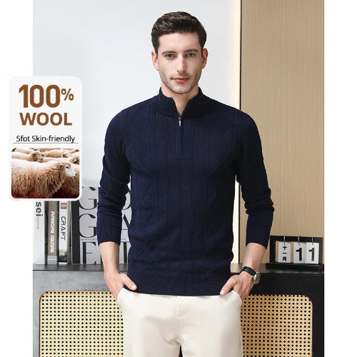 Man wearing a navy blue sweater with text about wool content on a minimal background
