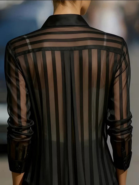 Black sheer striped shirt worn by a model, shown from the back.