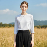 White long-sleeve shirt worn by a mannequin against a neutral background