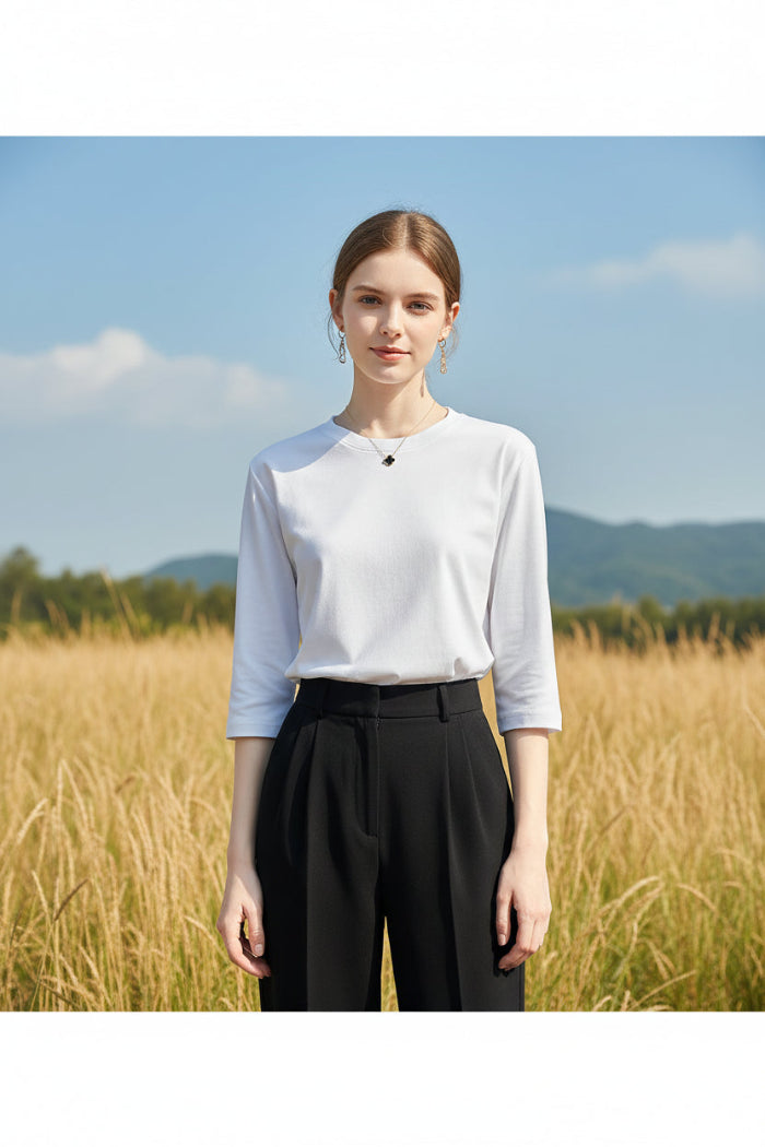 White long-sleeve shirt worn by a mannequin against a neutral background