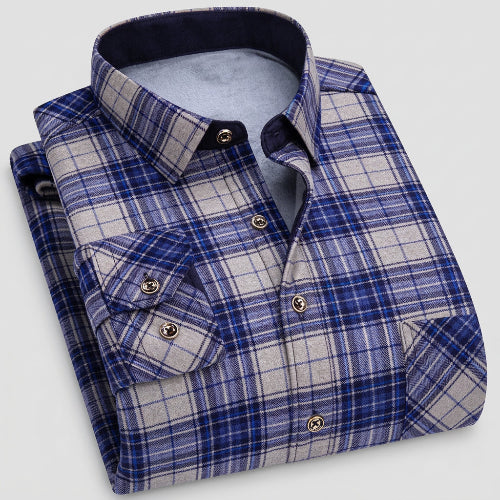 Folded blue and gray plaid shirt with close-up of fabric texture on a white background