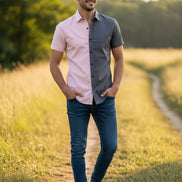 Two-tone pink and gray shirt on a white background