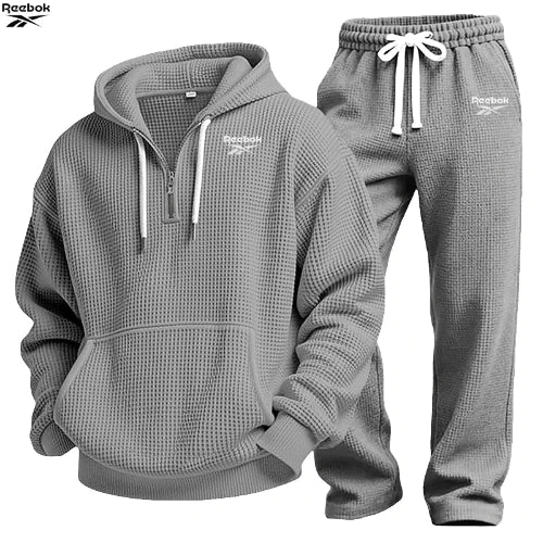 Gray textured hoodie and jogger pants set on a white background