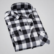 Black and white checkered shirt on a light gray background