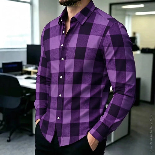 A man wearing a purple and black buffalo check plaid long-sleeve button-down shirt in an office environment.