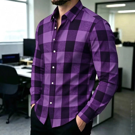 A man wearing a purple and black buffalo check plaid long-sleeve button-down shirt in an office environment.