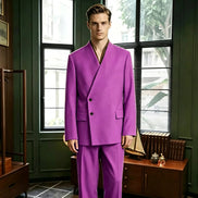 A man wearing a bright purple two-piece suit with a unique wrap-style collar, standing in a dark green room with windows and wooden furniture.