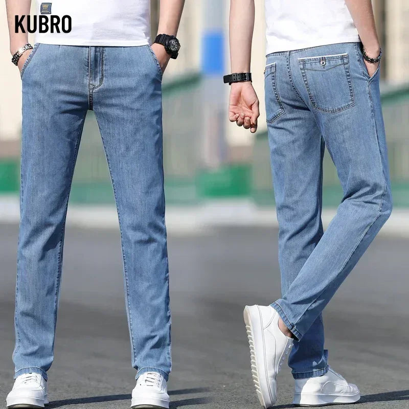Two people wearing blue jeans with a blurred background, featuring the brand 'KUBRO'.